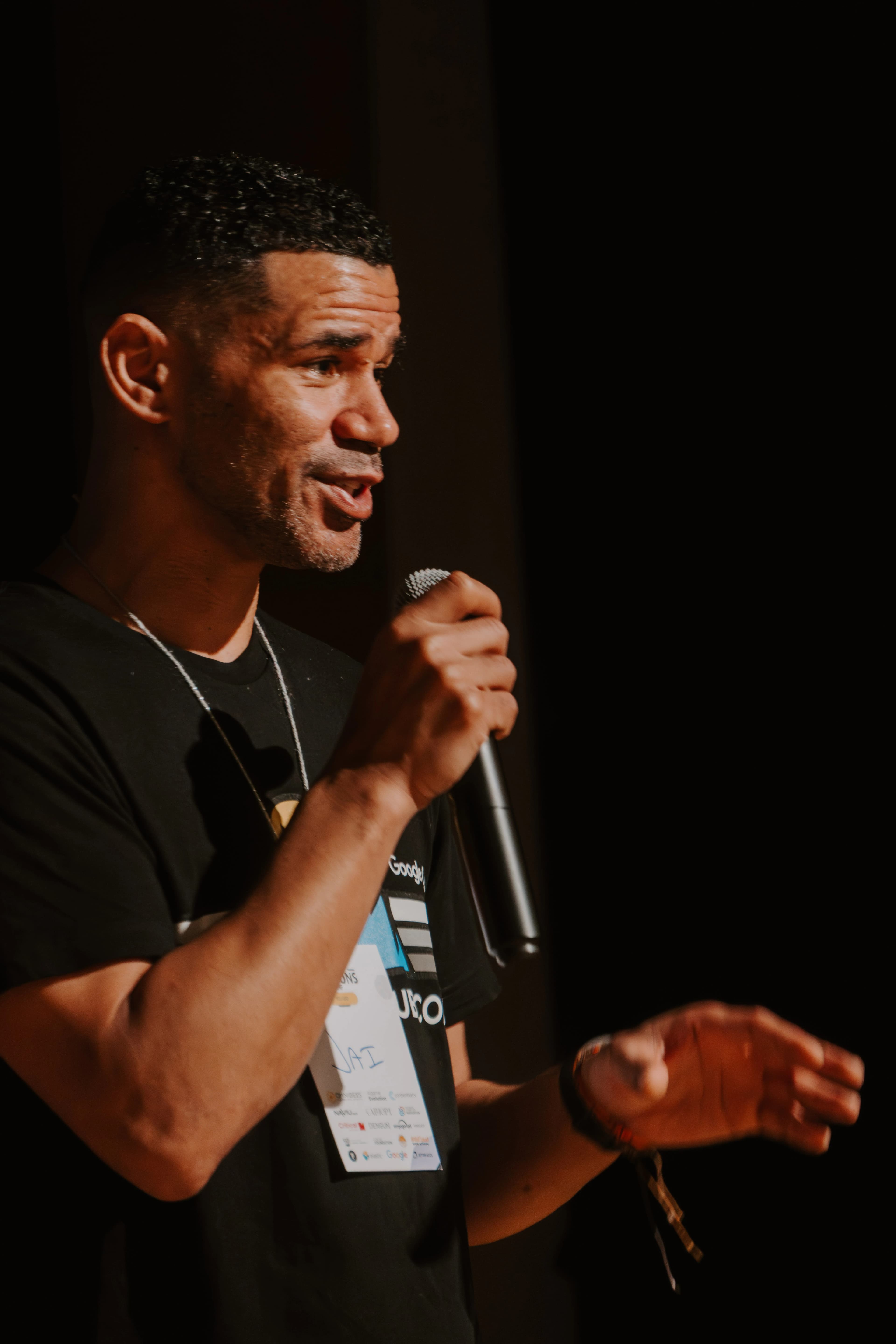 Attendees networking and engaged in conversations at GeekSessionsConf 2025